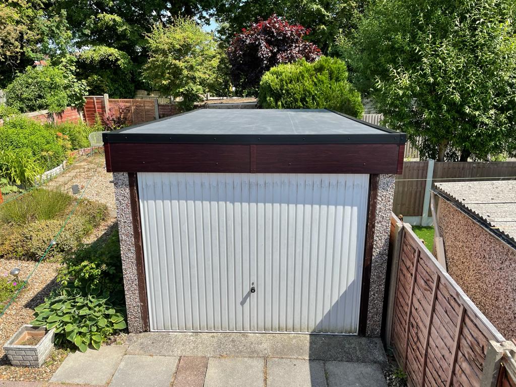 Garage with a flat roof