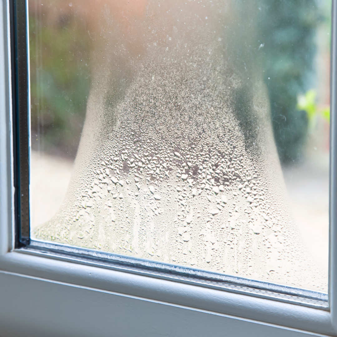 a photograph of cloudy double glazing